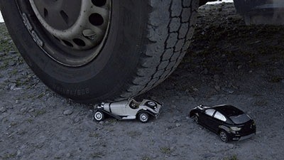 2 Little Cars Under My Giant Tires